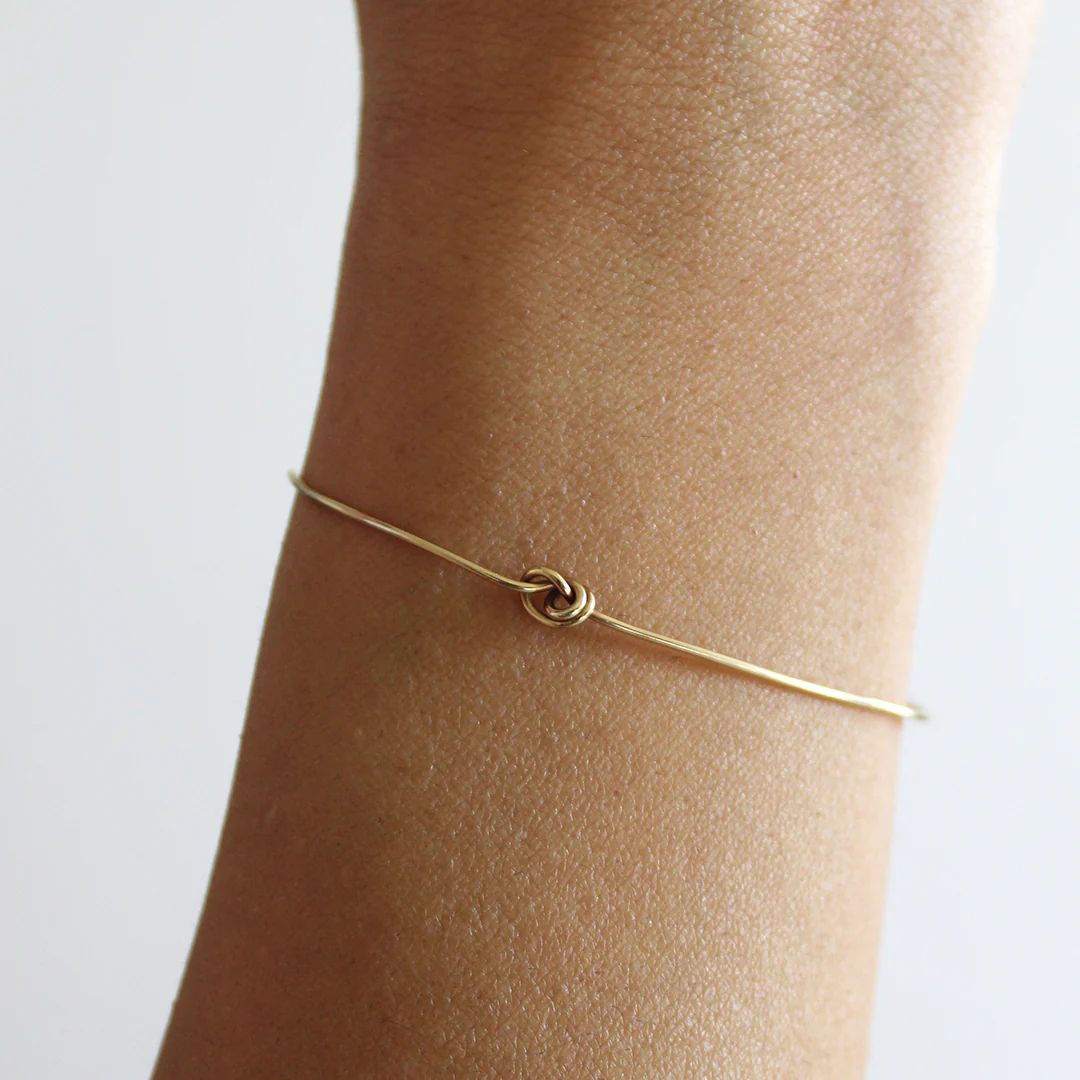 Bracciale Donna Filo D'Amore Cupido Oro Giallo 9 KT Intreccio Semirigido BR236G-M